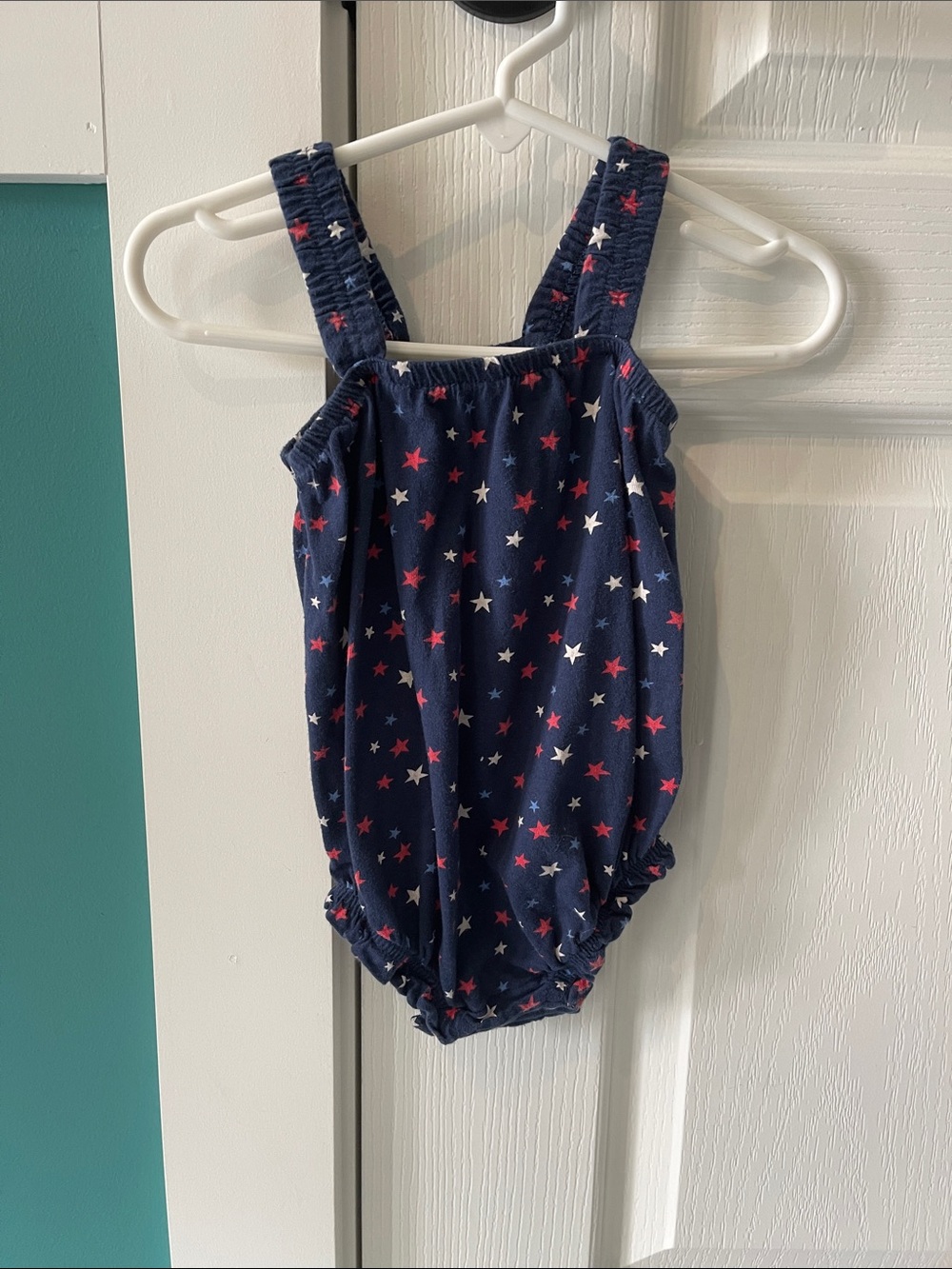 Old Navy navy romper with red and white stars